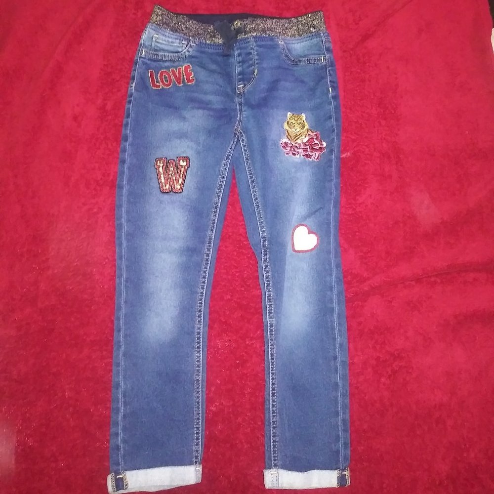 Pair of girls Wonder Nation jeans size 10/12